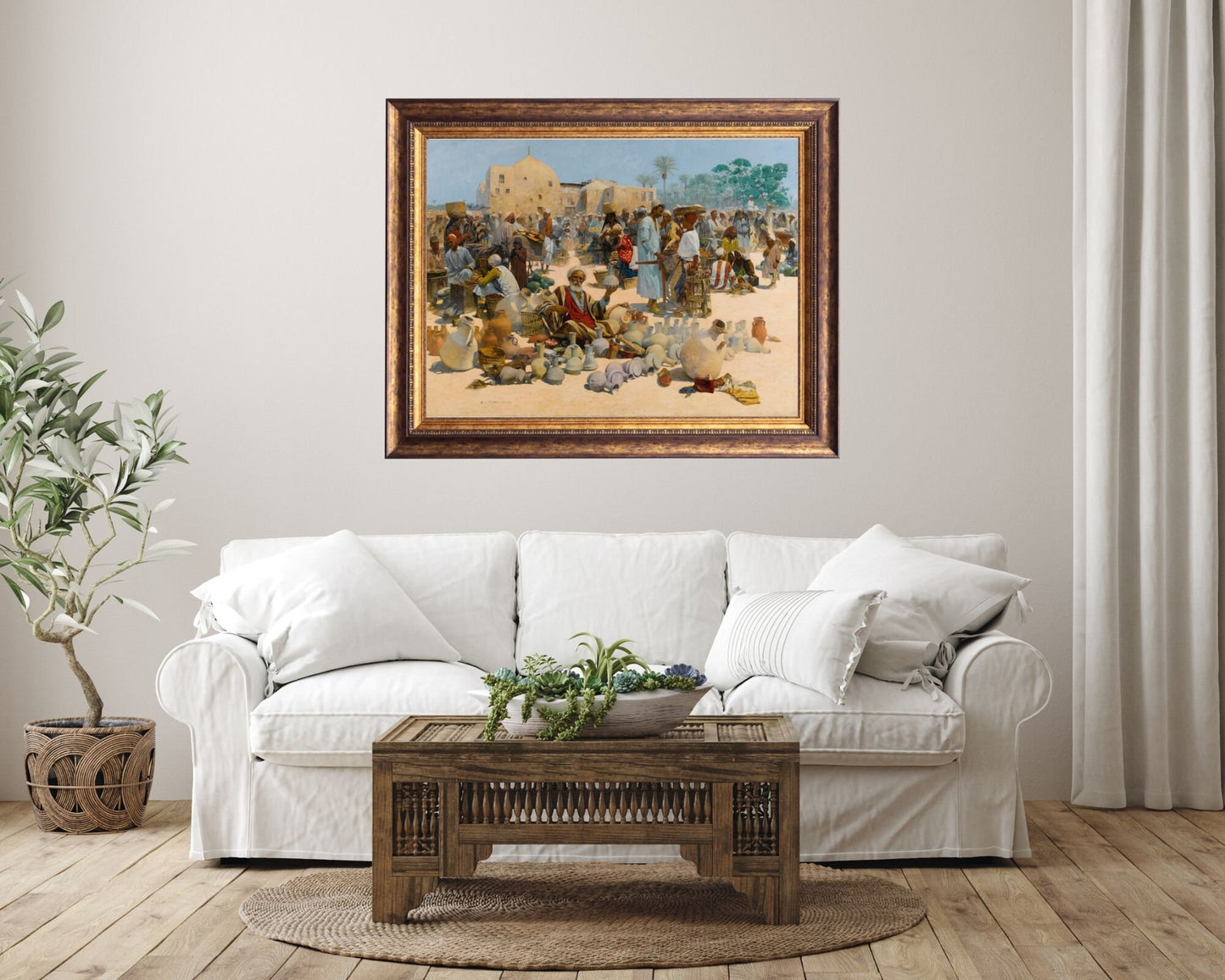 The Pottery Seller by Alphons Leopold Art Print Reproduction framed hanging above white sofa in living room