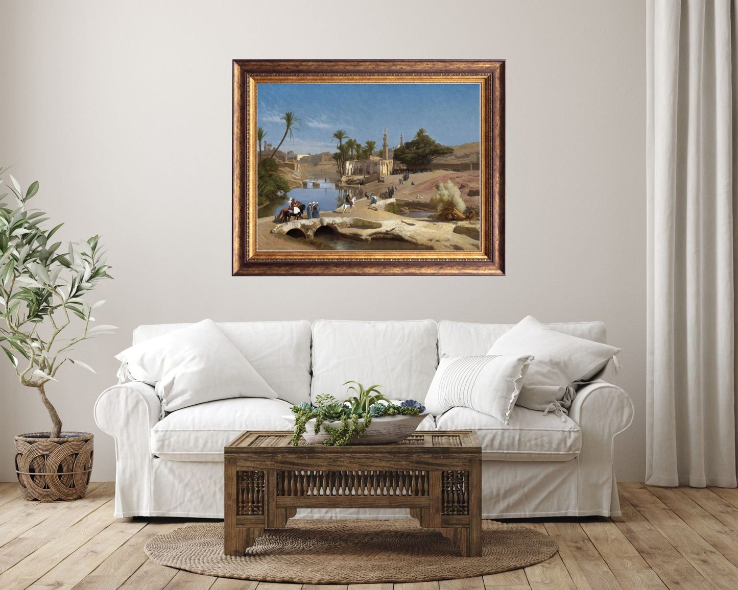 View from Medinat El-Fayoum by Jean Leon Gerome Art Print framed hanging above white sofa in living room