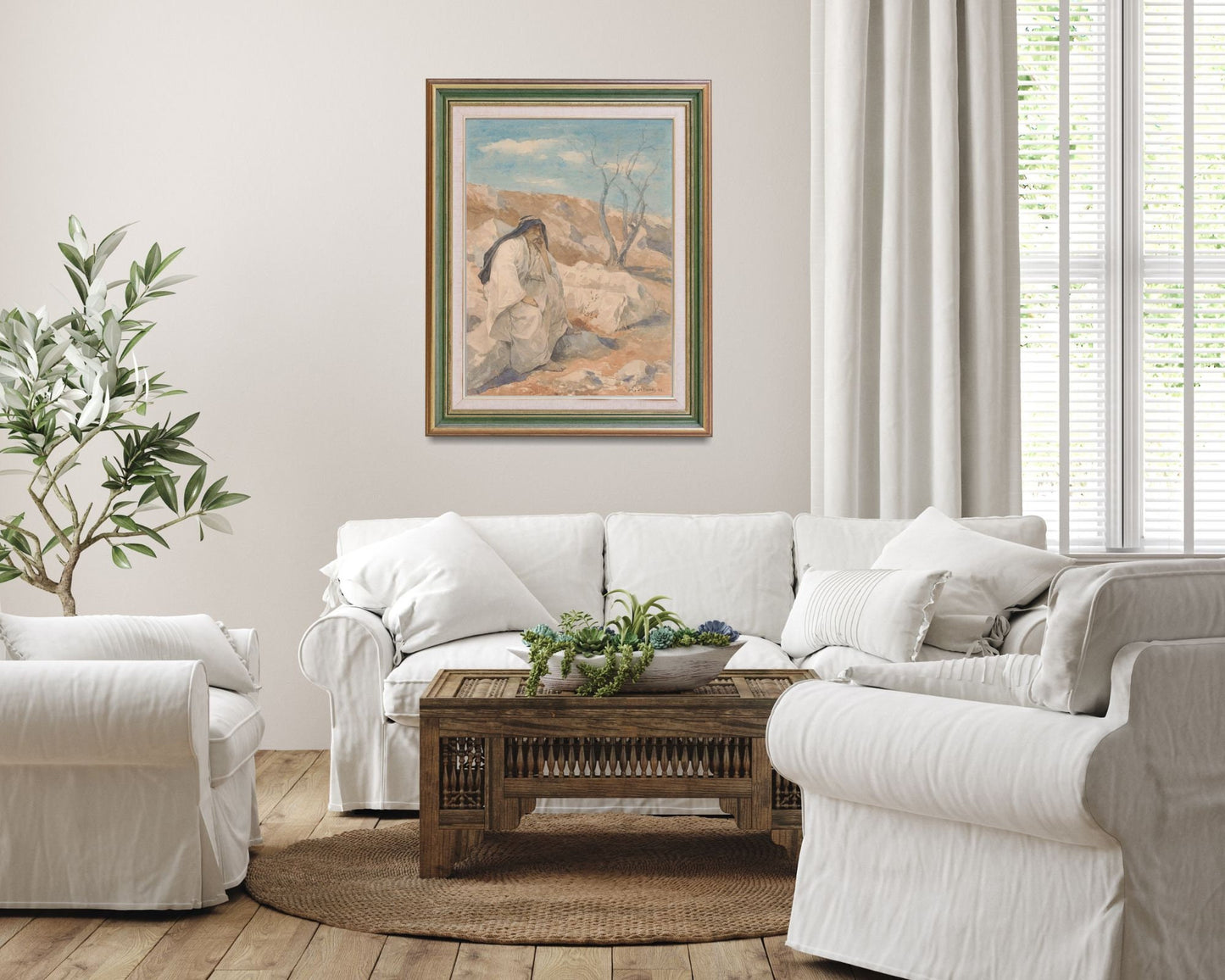 Seated Man in a Desert Painting by Juliaan De Vriendt Wall Art Print framed hanging on wall above white sofa