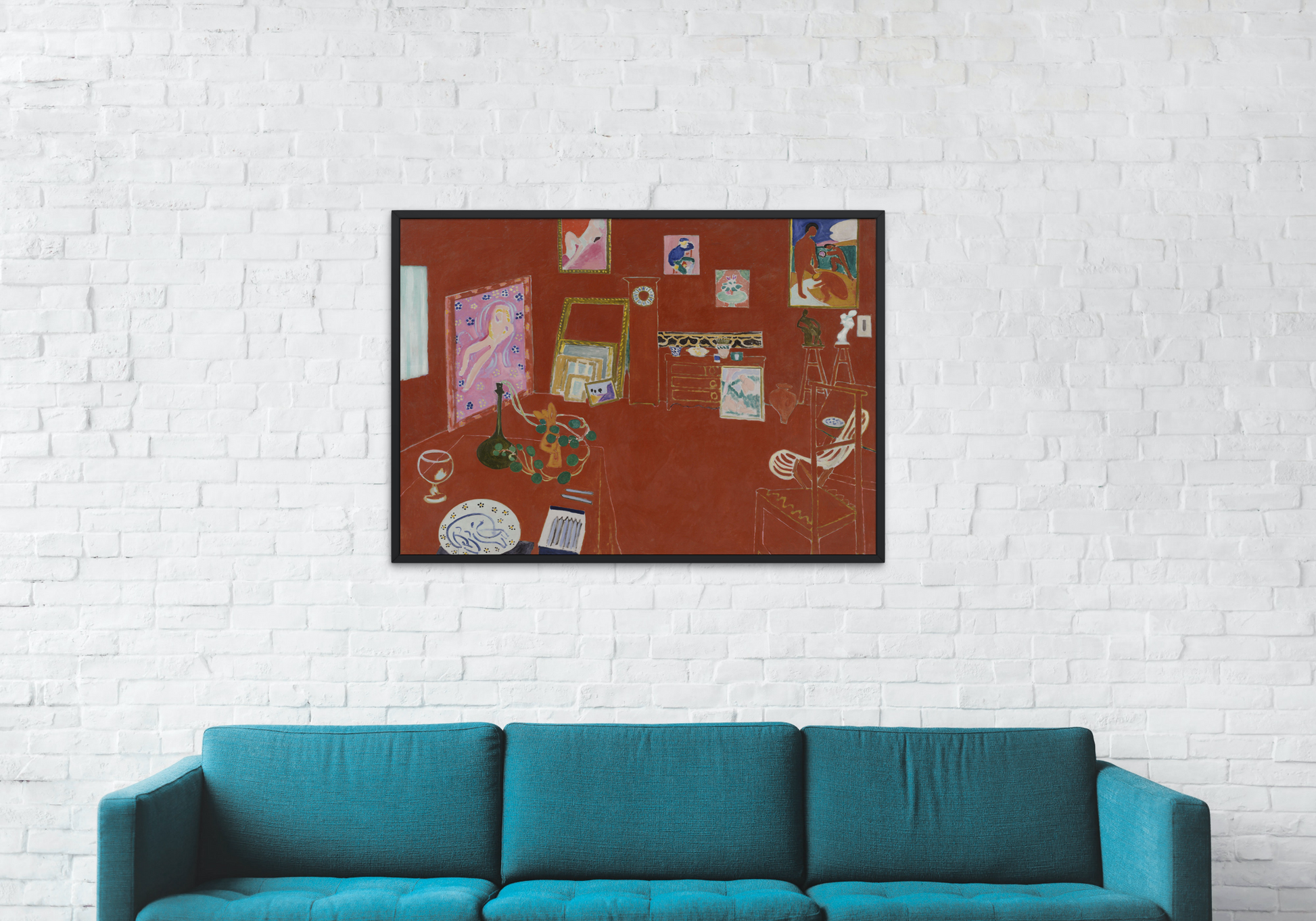 Henri Matisse The Red Studio Art Print  hanging above couch in living room