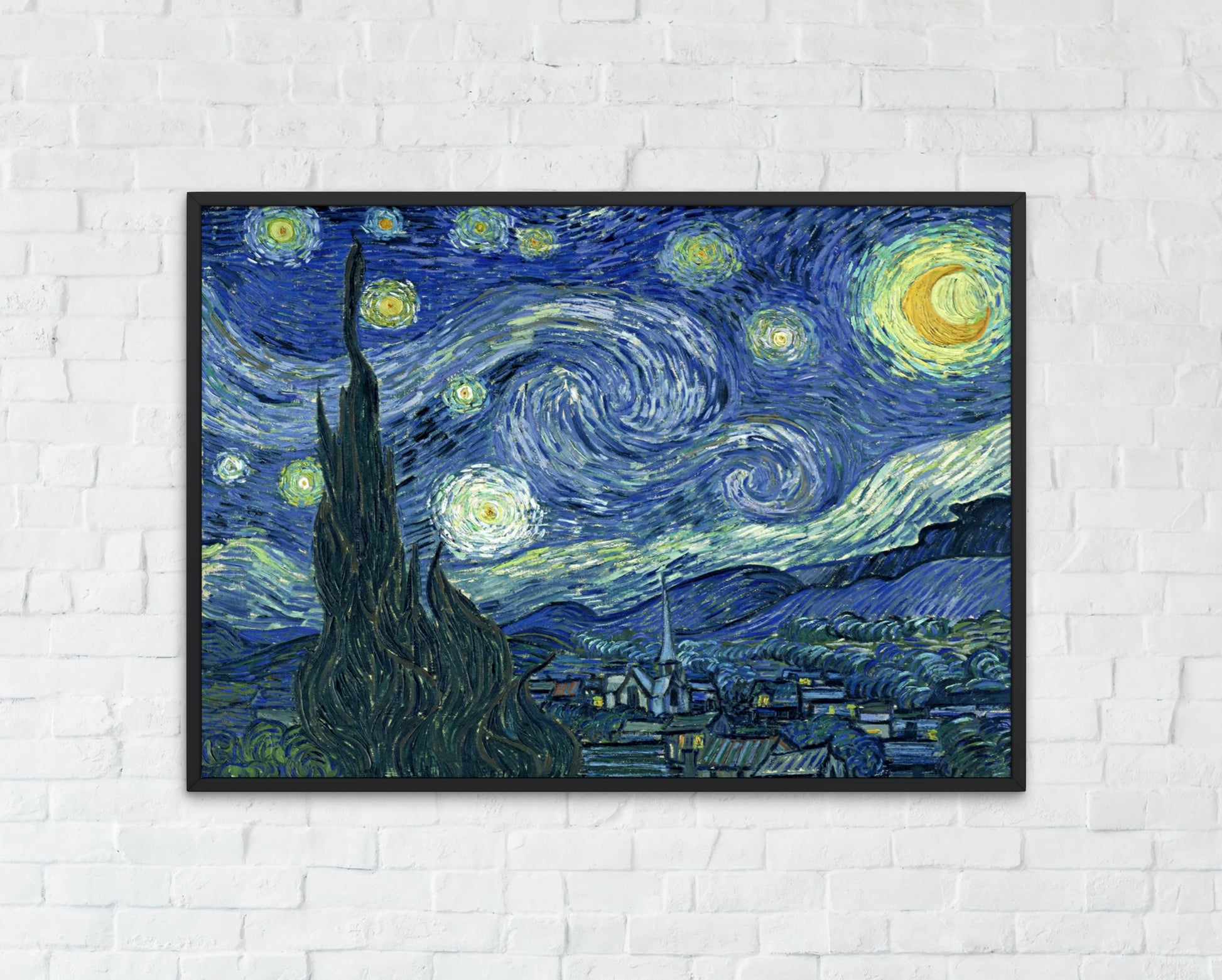 starry night by van gogh art print with black frame hanging on wall