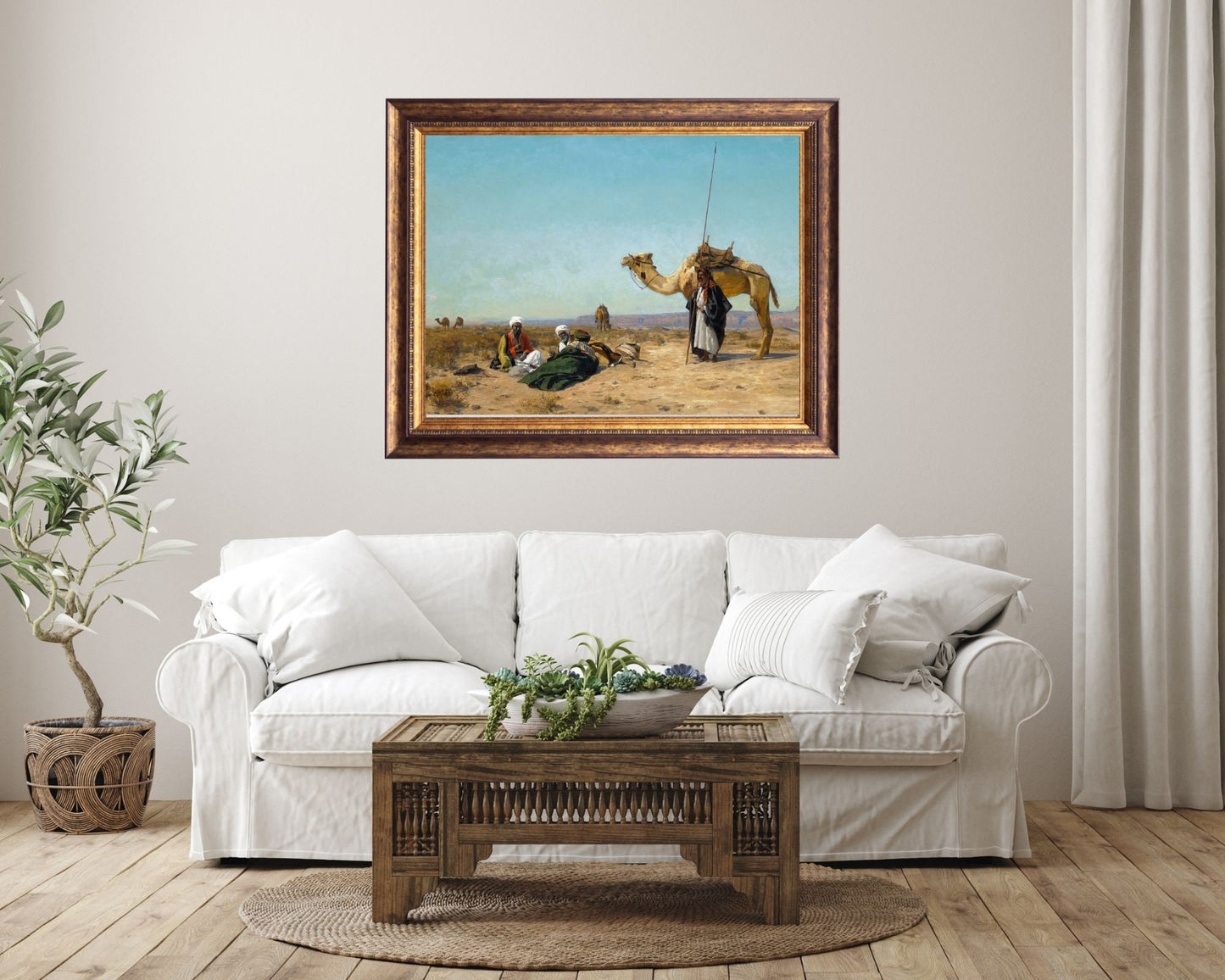 Rest in the Syrian Desert Painting by Eugen Bracht Art Print framed hanging above white sofa in living room